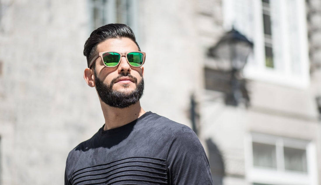 Man wearing mirror lens sunglasses