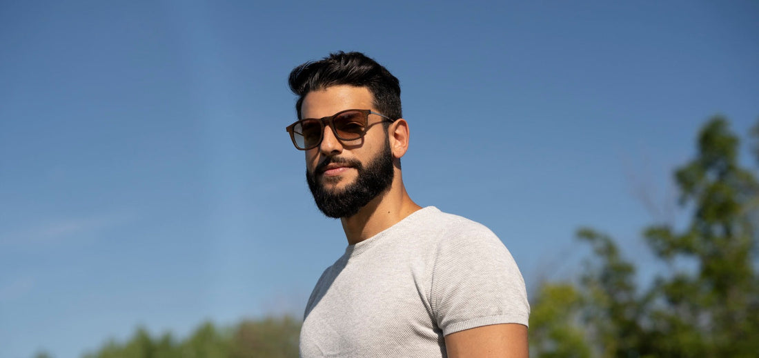 man wearing Hazel, high quality sunglasses, on a sky background