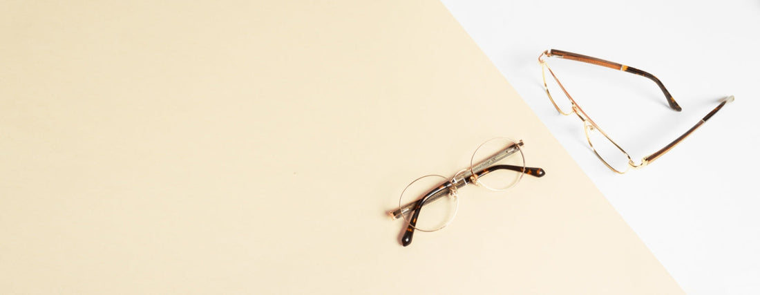 Kraywoods glasses from oval face shape collection on a white and pink color block background