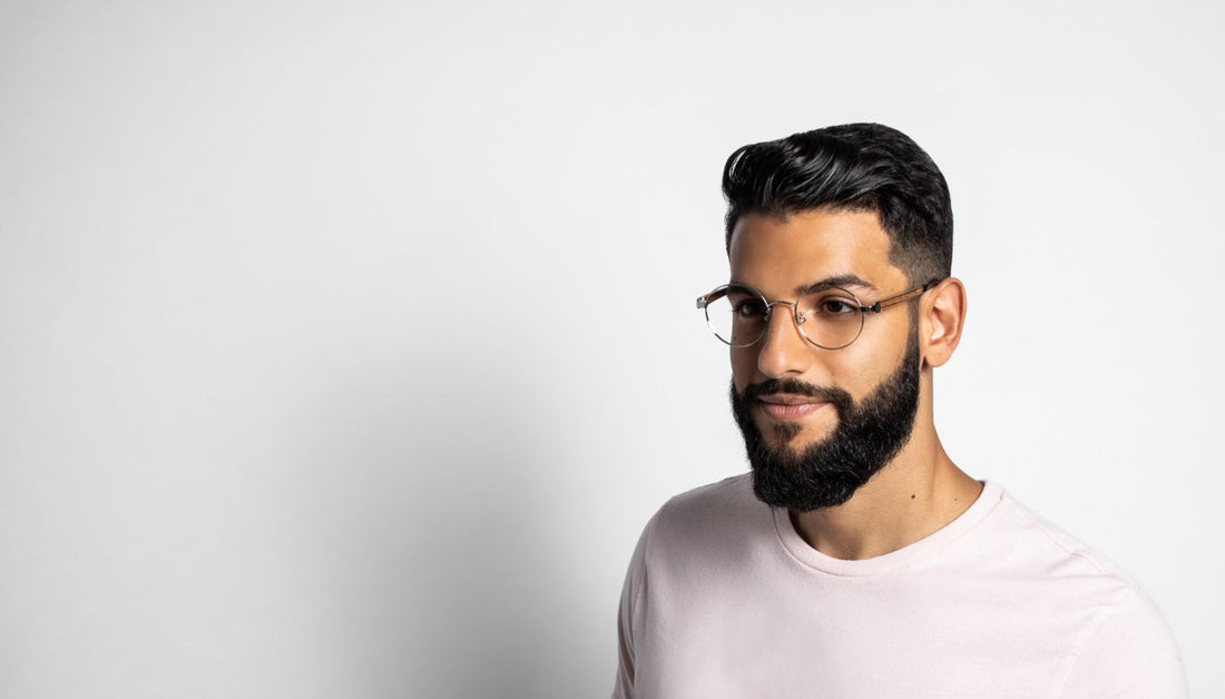 man featuring Kraywoods eyeglasses collection on a white background