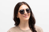 Woman wearing Austin Black , Round Black Metal Sunglasses