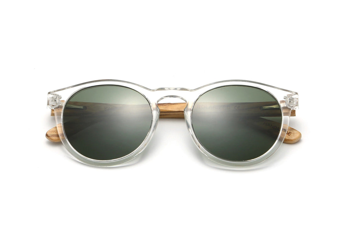 Funk, Lunettes de soleil rondes à monture transparente et verres verts - pliées