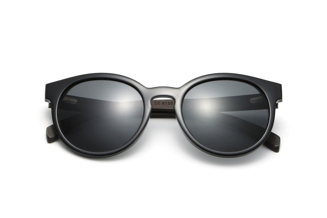 Luxy, Lunettes de soleil polarisantes rondes noires - pliées