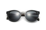Luxy, Lunettes de soleil polarisantes rondes noires - pliées
